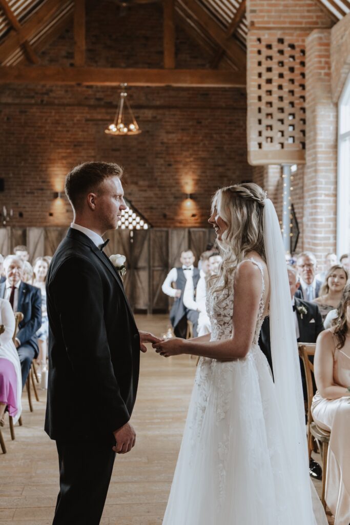 Swallows Nest Barn wedding photographer capturing a ceremony at Swallows Nest Barn in Warwick