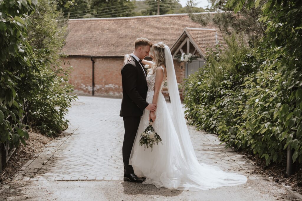 Warwick wedding photographer capturing couples portraits at Swallows Nest Barn