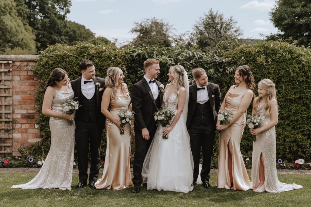Northamptonshire wedding photographer capturing bridesmaids and groomsmen at Swallows Nest Barn