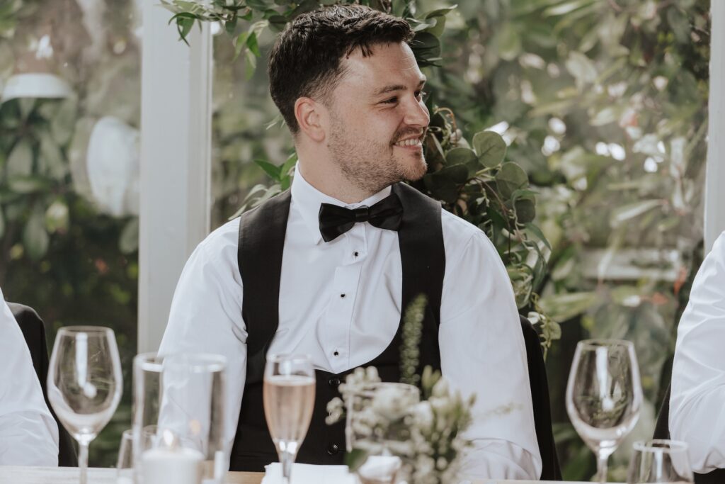 Northamptonshire wedding photographer capturing candids during Swallows Nest Barn