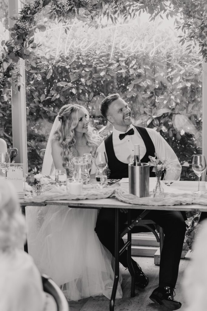 Wedding photographer in Northamptonshire capturing candids during Swallows Nest Barn