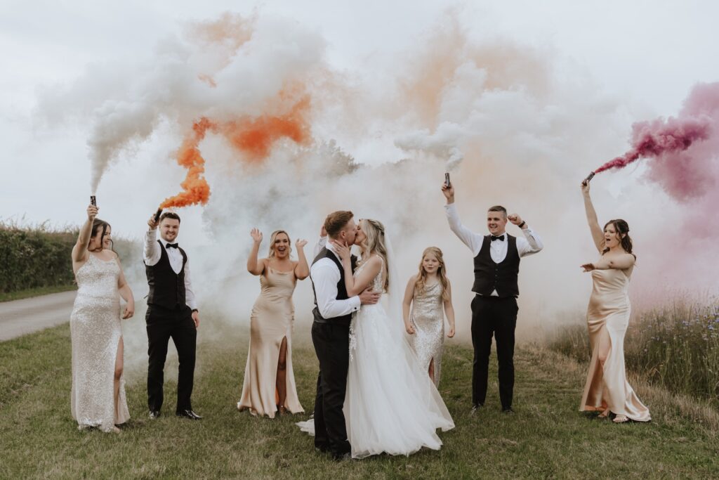 Fun evening photos with bridesmaids and groomsmen at Swallows Nest Barn in Northamptonshire