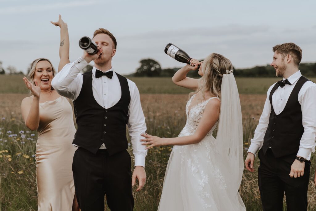 Warwickshire wedding photographer capturing fun evening candids at Swallows Nest Barn