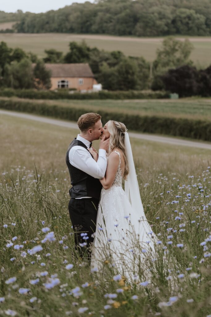 Swallows Nest Barn wedding photographer capturing couples portraits at Swallows Nest Barn