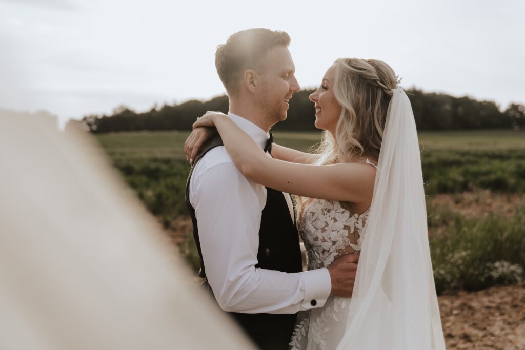 Northamptonshire wedding photographer capturing evening portraits at Swallows Nest Barn