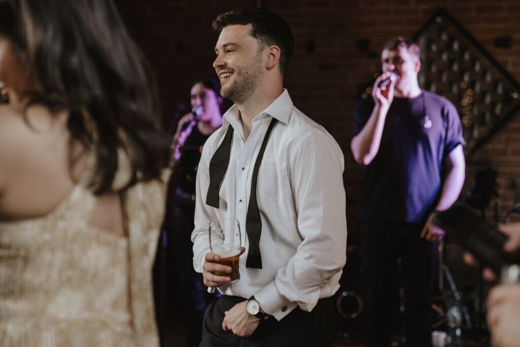 Swallows Nest Barn wedding photographer capturing dance floor moments of guests