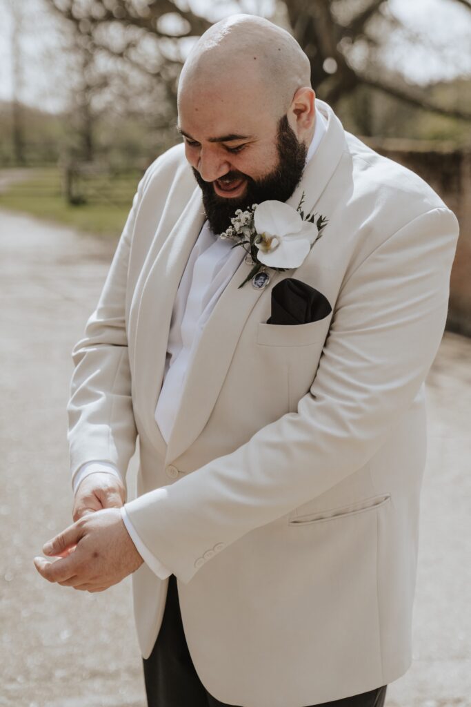 The groom getting ready at All Manor of Events in Suffolk