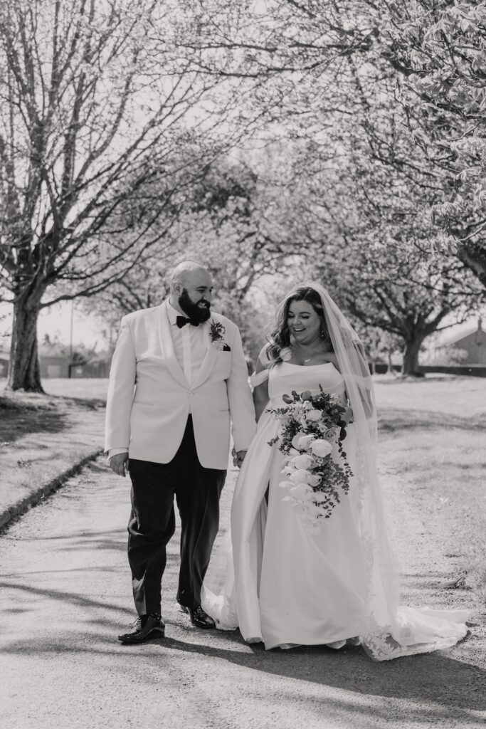 A couple at All Manor of Events in Suffolk having their wedding portraits taken