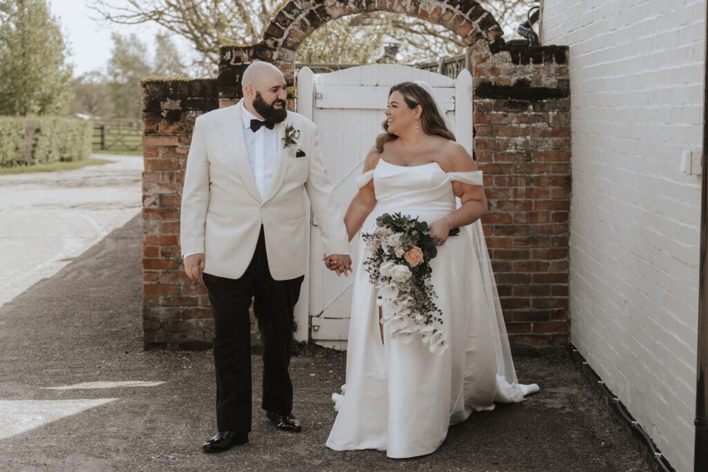 Relaxed wedding portraits of a couple in Suffolk at All Manor of Events