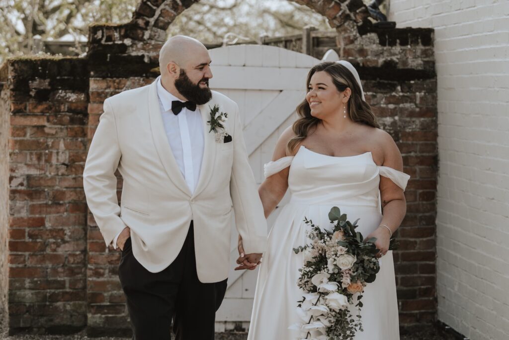 A wedding couple at All Manor of Events during their wedding portraits in Suffolk