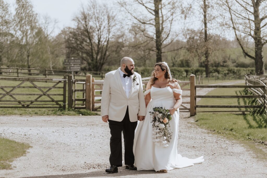 A wedding couple at All Manor of Events during their wedding portraits in Suffolk