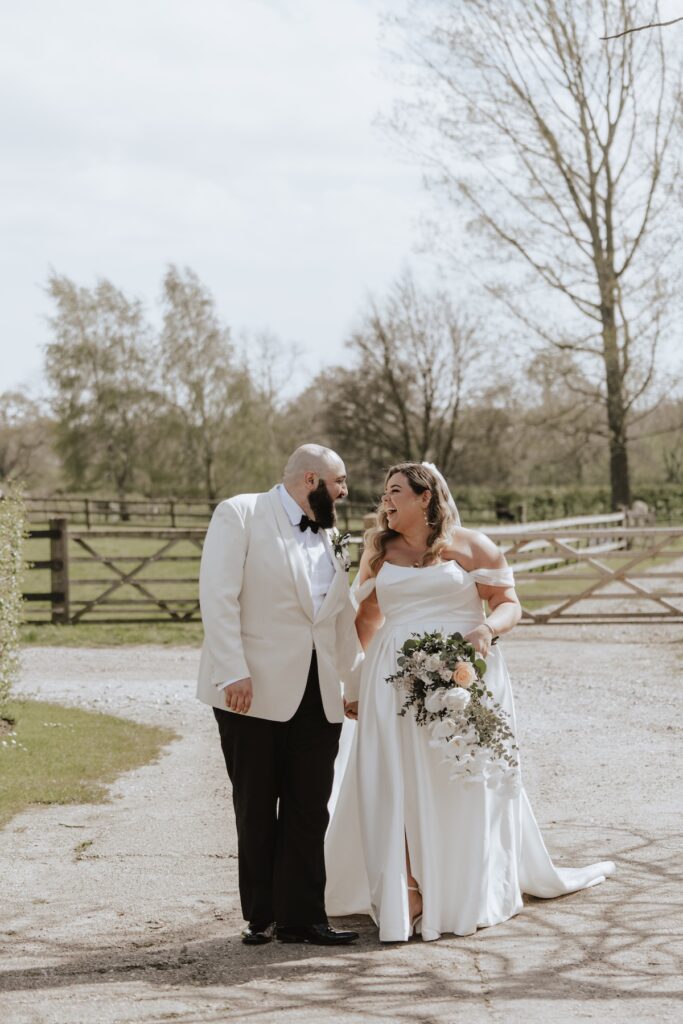 A wedding couple at All Manor of Events during their wedding portraits in Suffolk