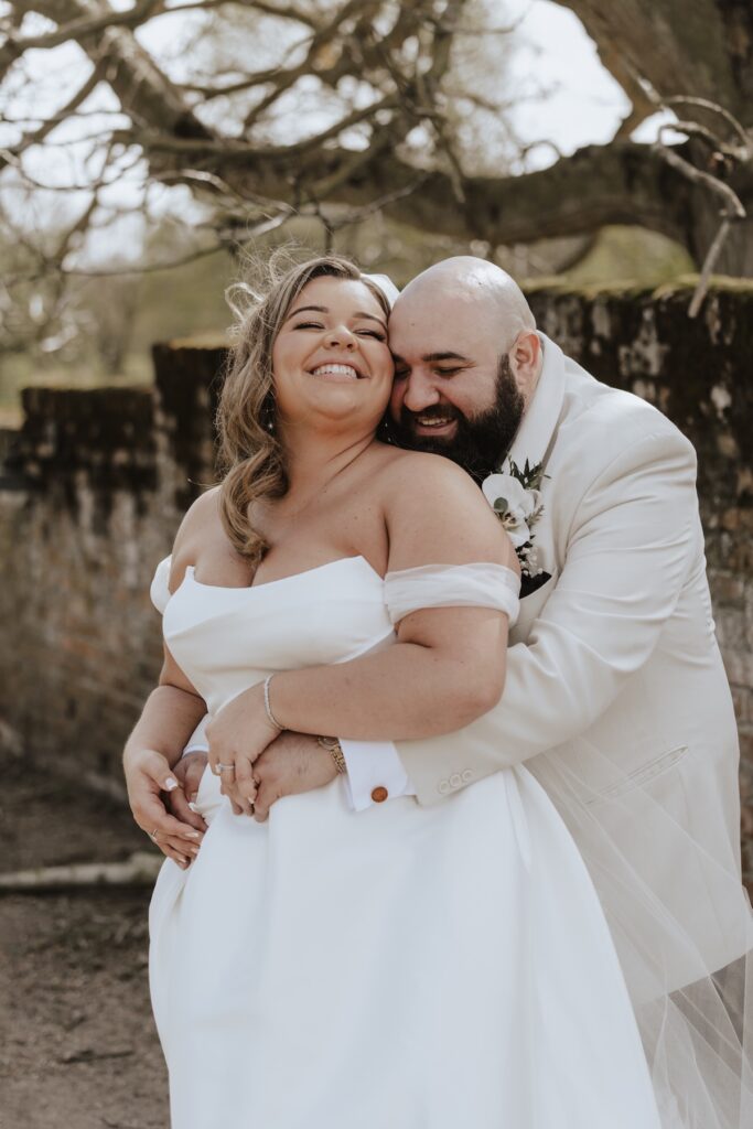 Relaxed wedding portraits of a couple at All Manor of Events in Ipswich, Suffolk
