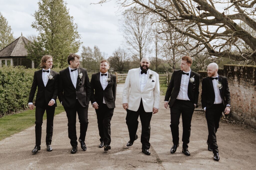 Fun and relaxed groomsmen photo ideas at All Manor of Events in Suffolk