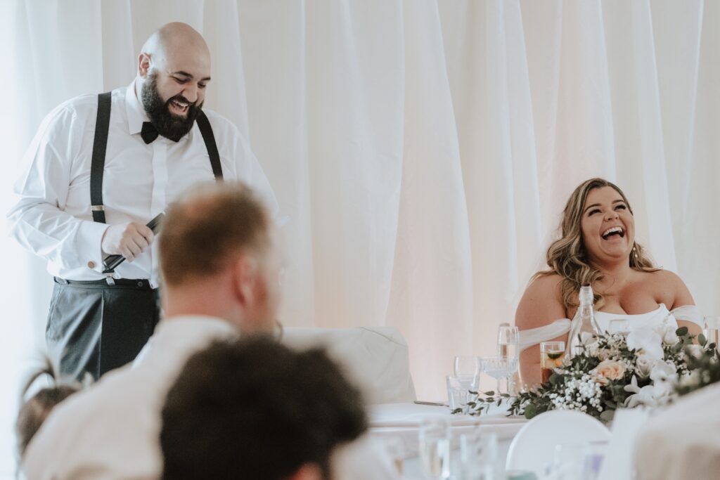 The groom giving a speech at their wedding in Suffolk at All Manor of Events in Ipswich