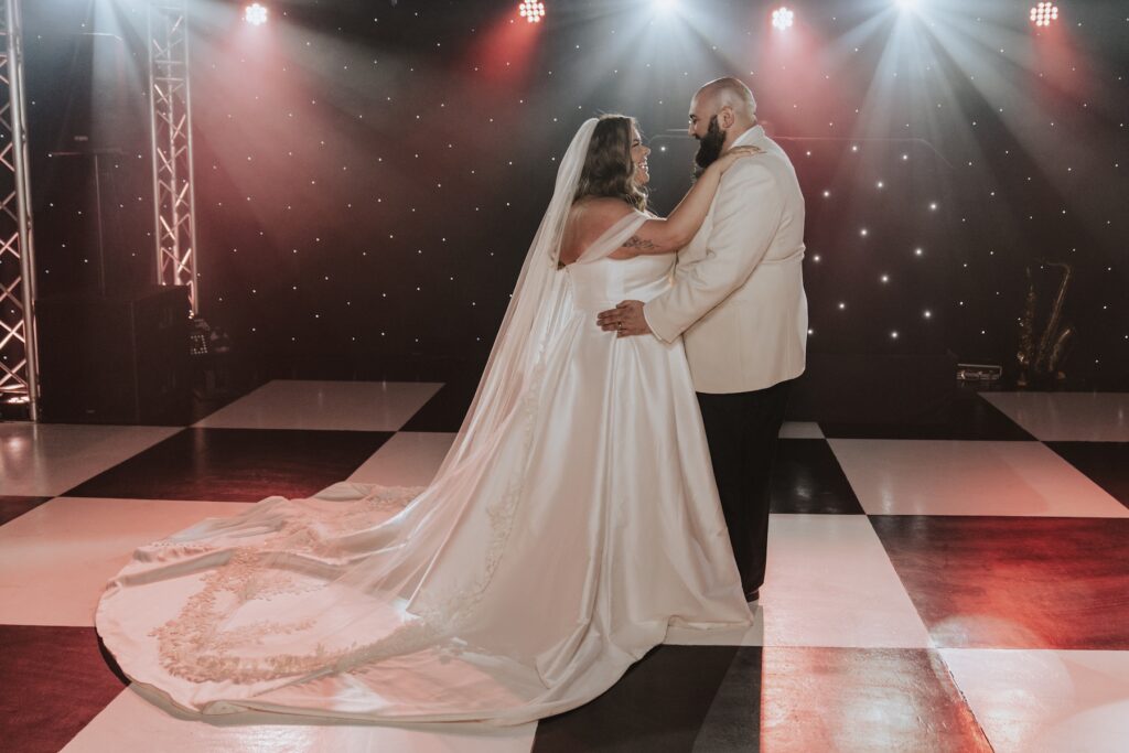 Suffolk wedding photographer capturing a couple doing their first dance at All Manor of Events in Suffolk