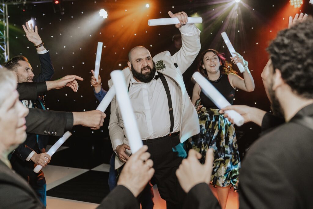 The groom on the dance floor at his Suffolk wedding