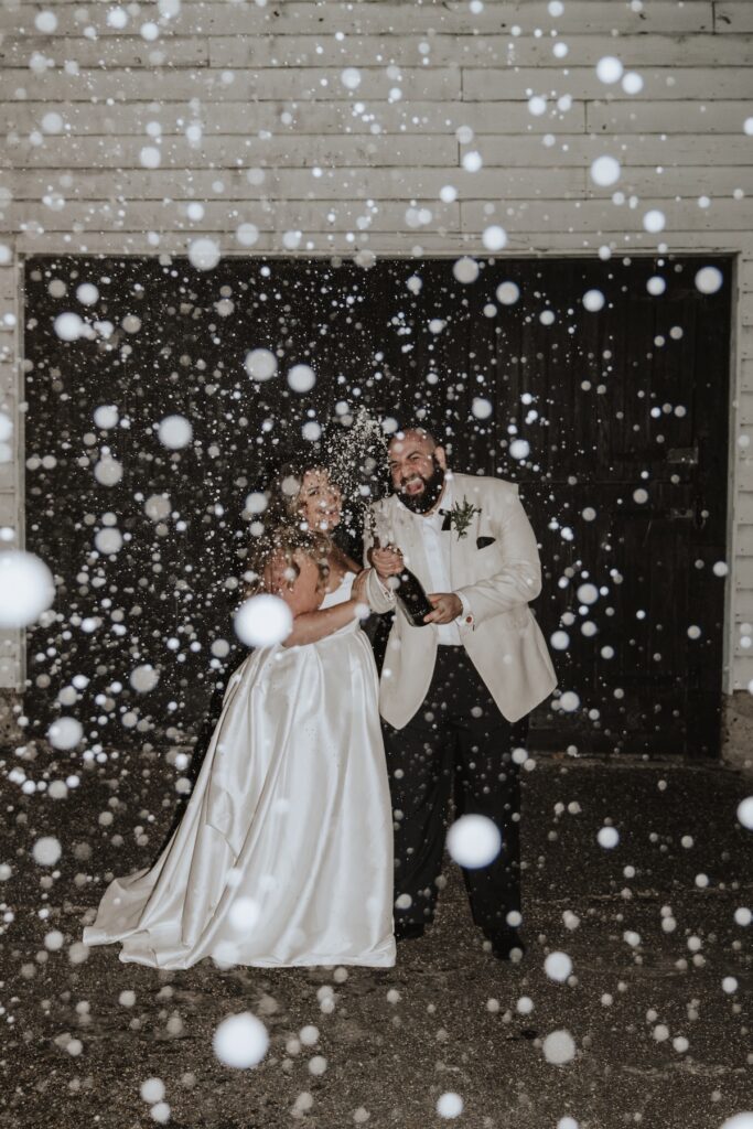 An evening champagne spray with flash at All Manor of Events in Suffolk