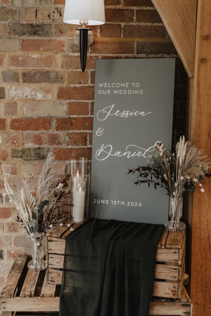 DIY wedding sign created for the couple at Bassmead Manor Barns