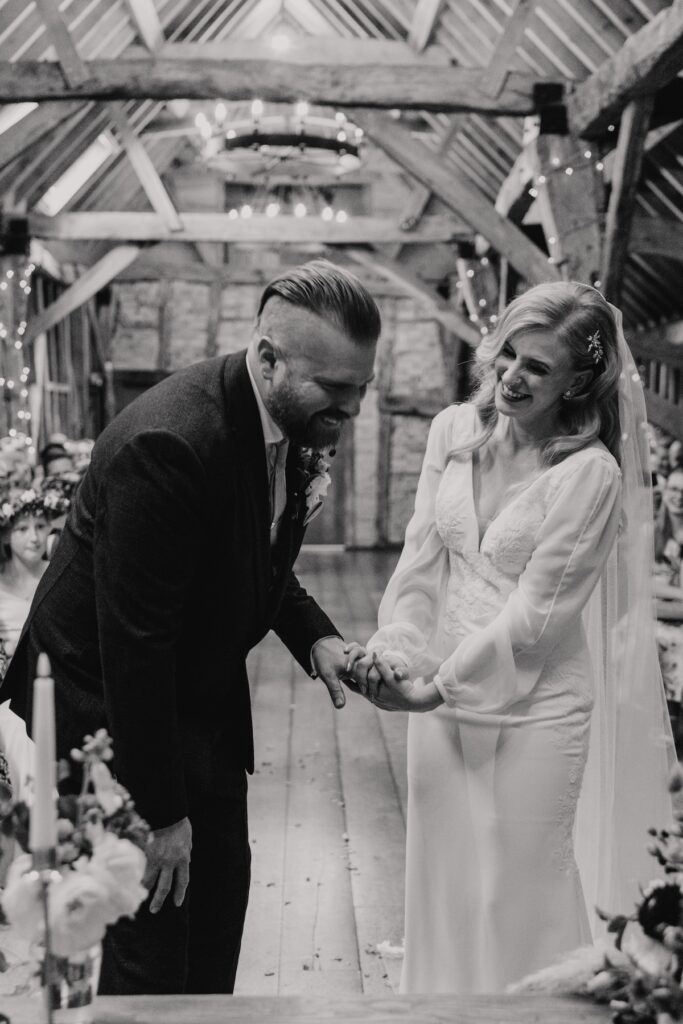 Fun moments during the ceremony at Bassmead Manor Barns in Cambridgeshire