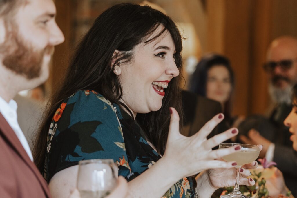 Candids of guests during the drinks reception at Bassmead Manor Barns in Cambridge