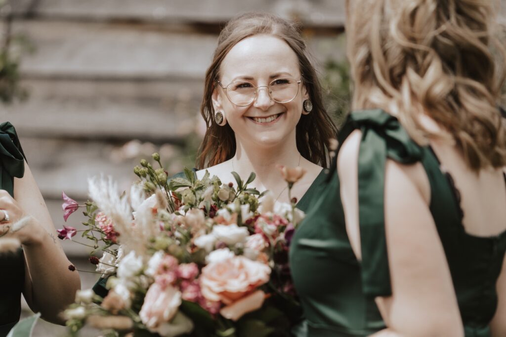 Cambridgeshire wedding photographer capturing candids of guests at Bassmead Manor Barns in St Neots