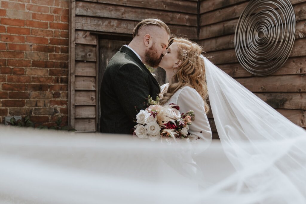 Couples wedding portraits at Bassmead Manor Barns in Cambridgeshire