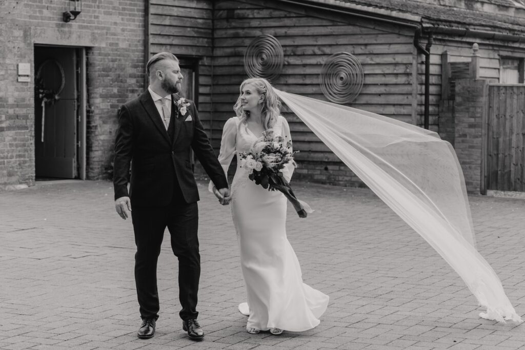 Cambridgeshire wedding photographer capturing wedding portraits at Bassmead Manor Barns in St Neots