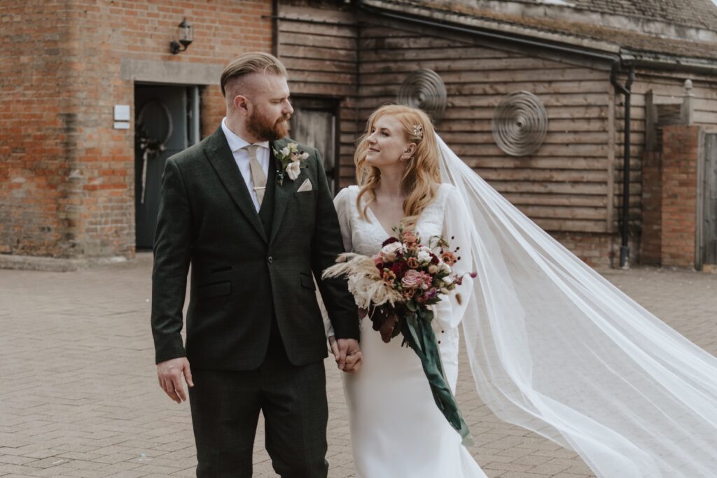 Cambridge wedding photographer capturing couples portraits at Bassmead Manor Barns in St Neots