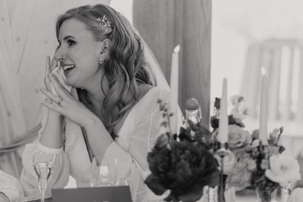 Emotional candids during speeches at Bassmead Manor Barns in Cambridgeshire