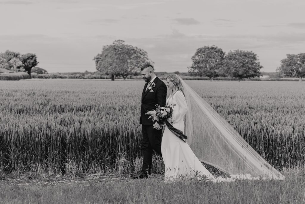Evening portraits of a couple at Bassmead Manor Barns in Cambridgeshire