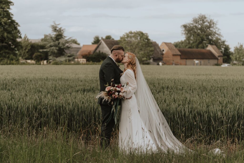 Evening portraits of a couple at Bassmead Manor Barns in Cambridgeshire