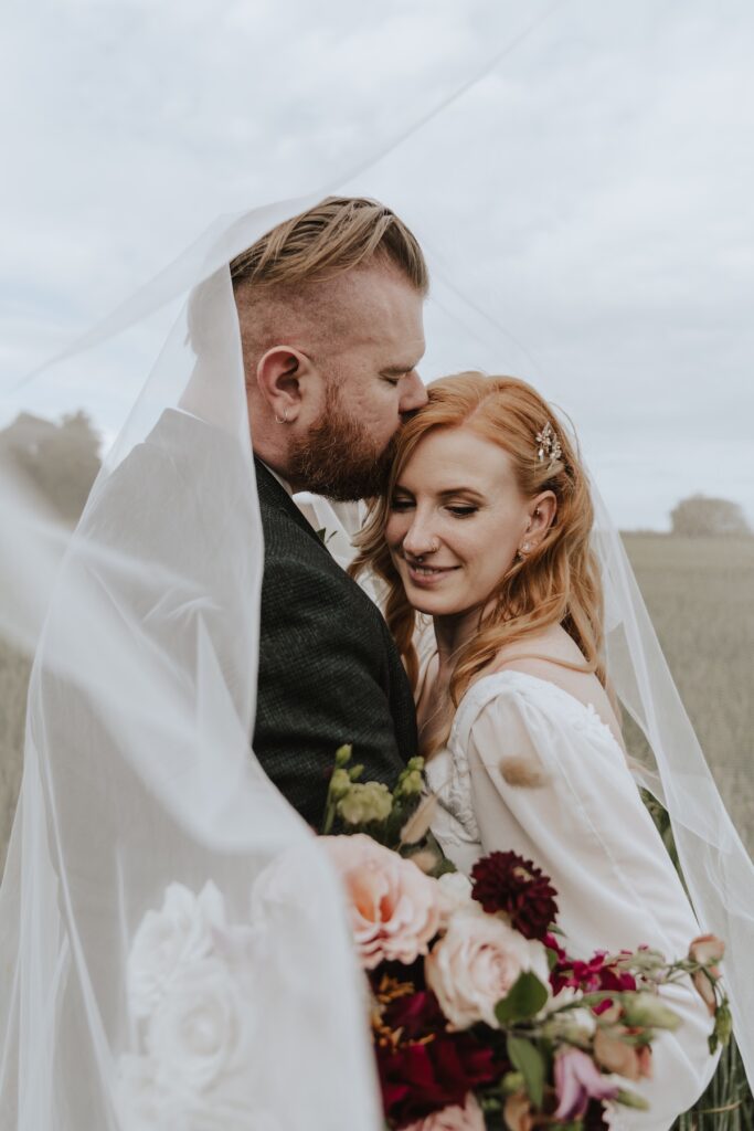 St Neots wedding photographer capturing evening portraits at Bassmead Manor Barns in Cambridgeshire