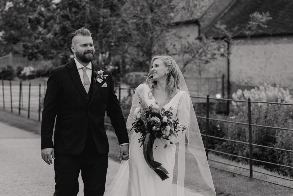 Evening portraits of a couple at Bassmead Manor Barns in Cambridgeshire