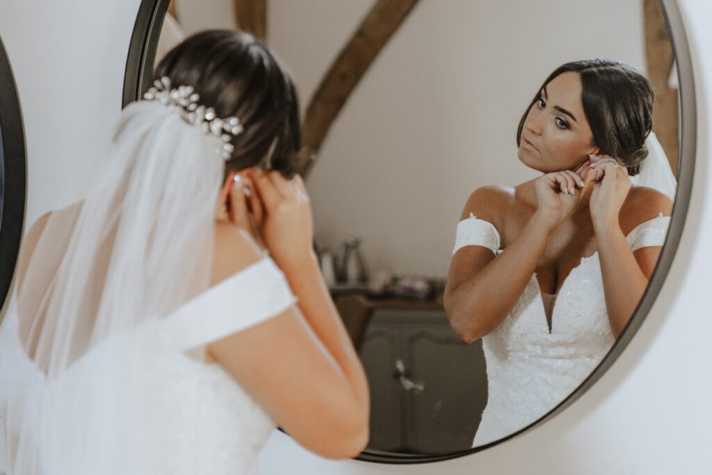 The bride getting ready in the bridal suite in Easton Grange in Suffolk