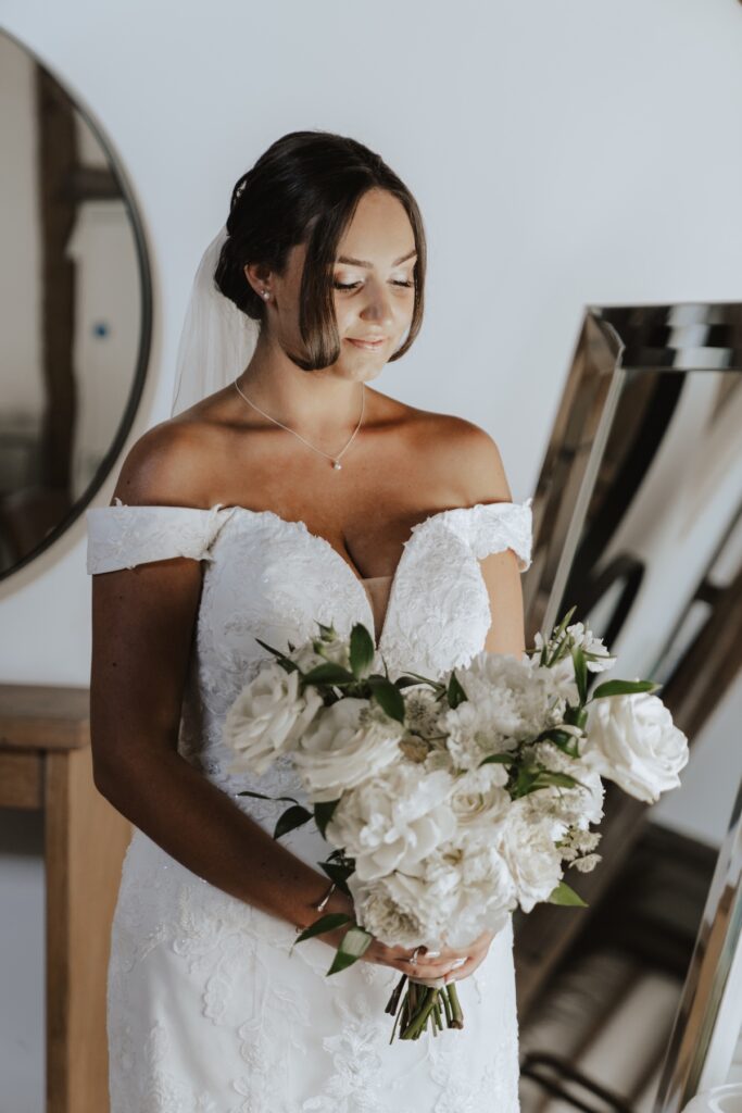 Suffolk wedding photographer capturing the bride getting ready at Easton Grange