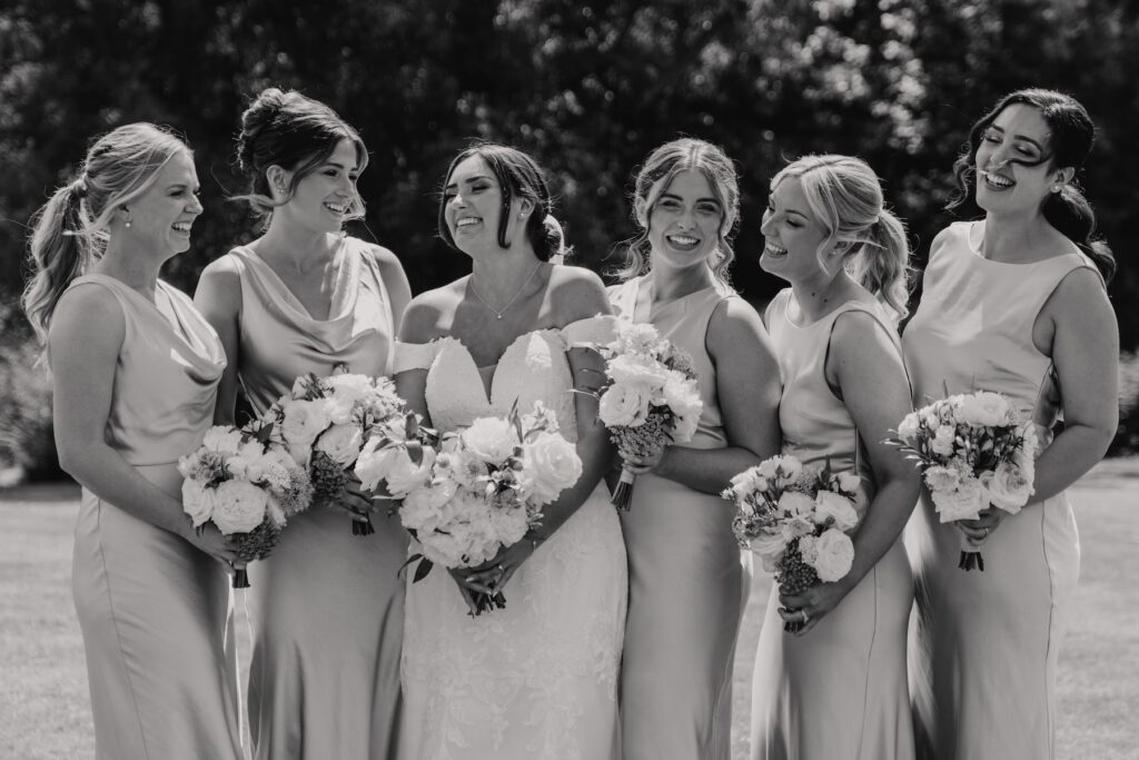 Photos with the bride and her bridesmaids at Easton Grange in Suffolk