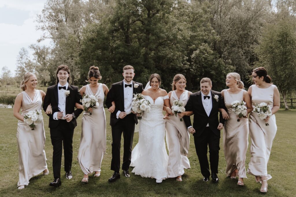 Suffolk wedding photographer capturing photos of bridesmaids and groomsmen at Easton Grange in Suffolk