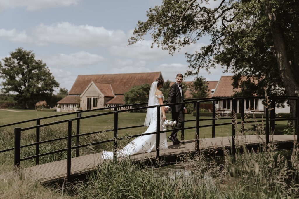 A newlywed couple having day portraits at Suffolk venue: Easton Grange