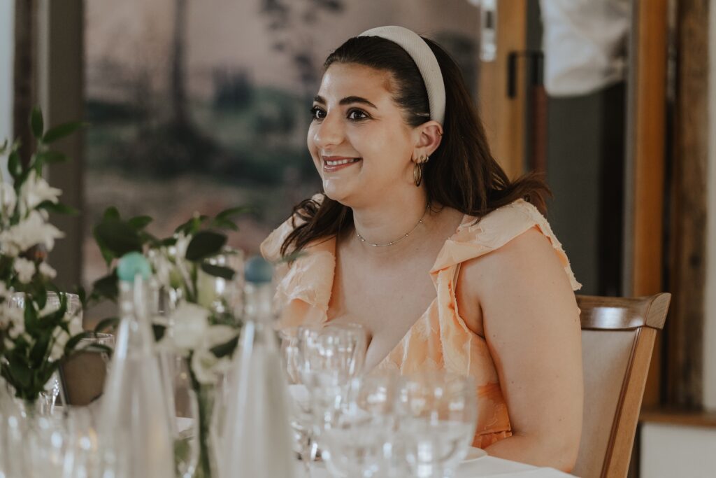 Wedding guest candids during speeches at Easton Grange in Suffolk