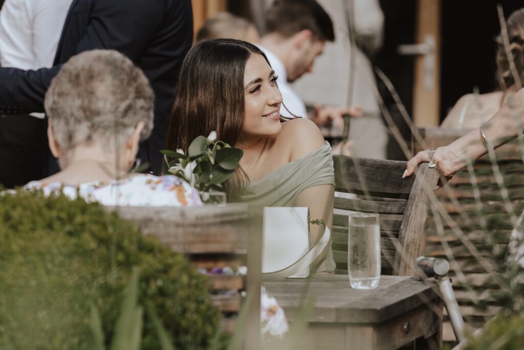 Evening candids of guests during the evening of a wedding at Easton Grange in Suffolk