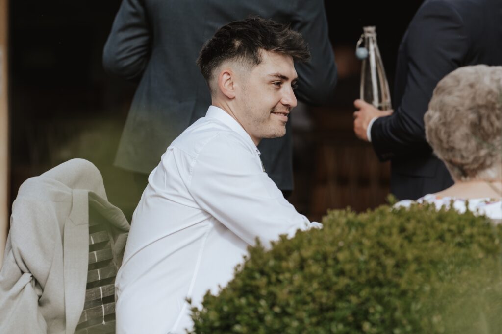 Candid photos of guests at a wedding at Easton Grange in Suffolk