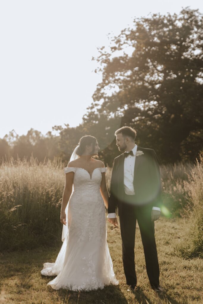 Suffolk wedding photographer capturing evening golden hour portraits at Easton Grange in Suffolk