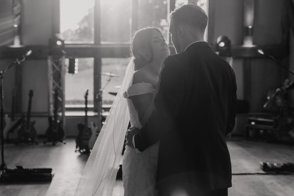 A couple during their first dance on their wedding day in Suffolk at Easton Grange