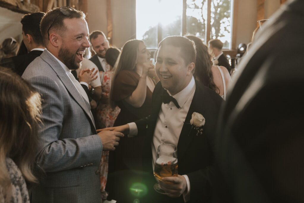 Guests dancing on the dance floor at Easton Grange during a Suffolk wedding