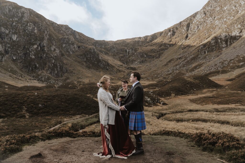 A couple eloping in the cairngorms during their ceremony