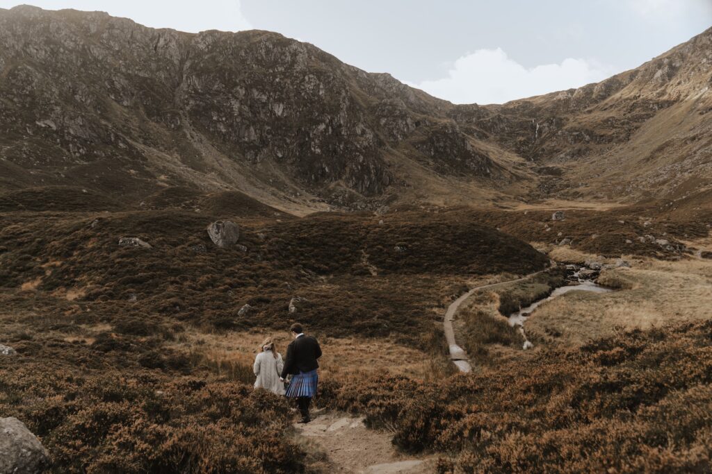 Relaxed couples portraits at Corrie Fee in the cairngorms