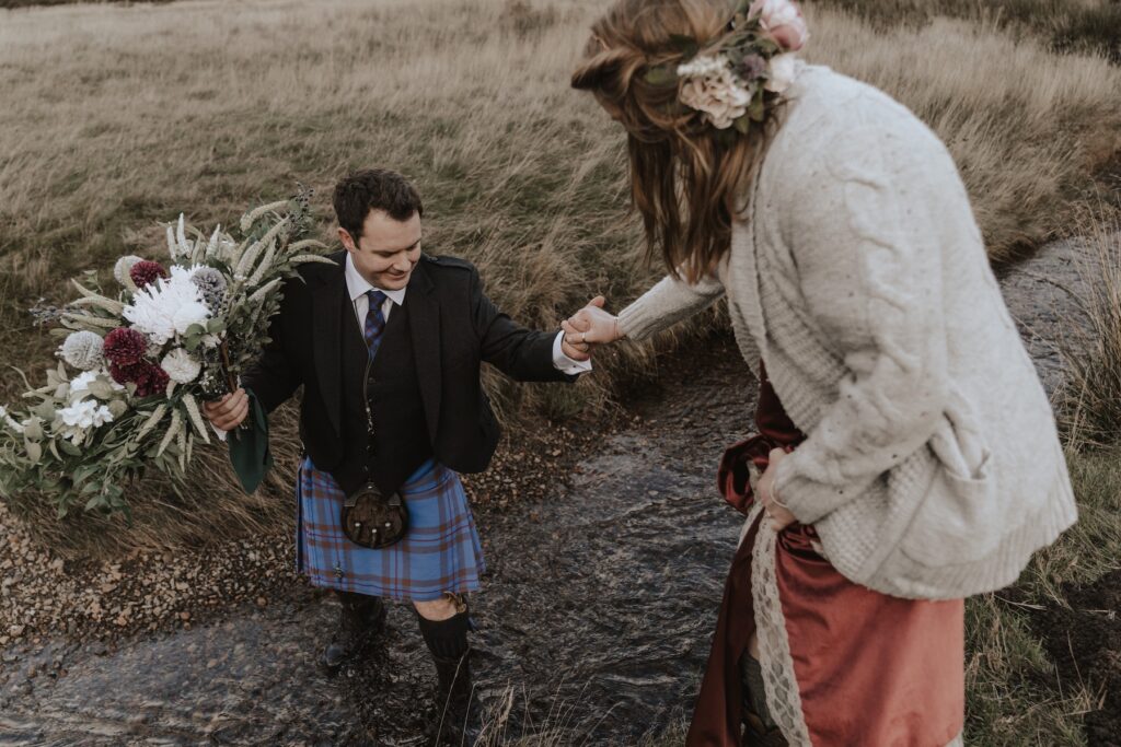 Scotland elopement photographer capturing small moments on an adventurous elopement