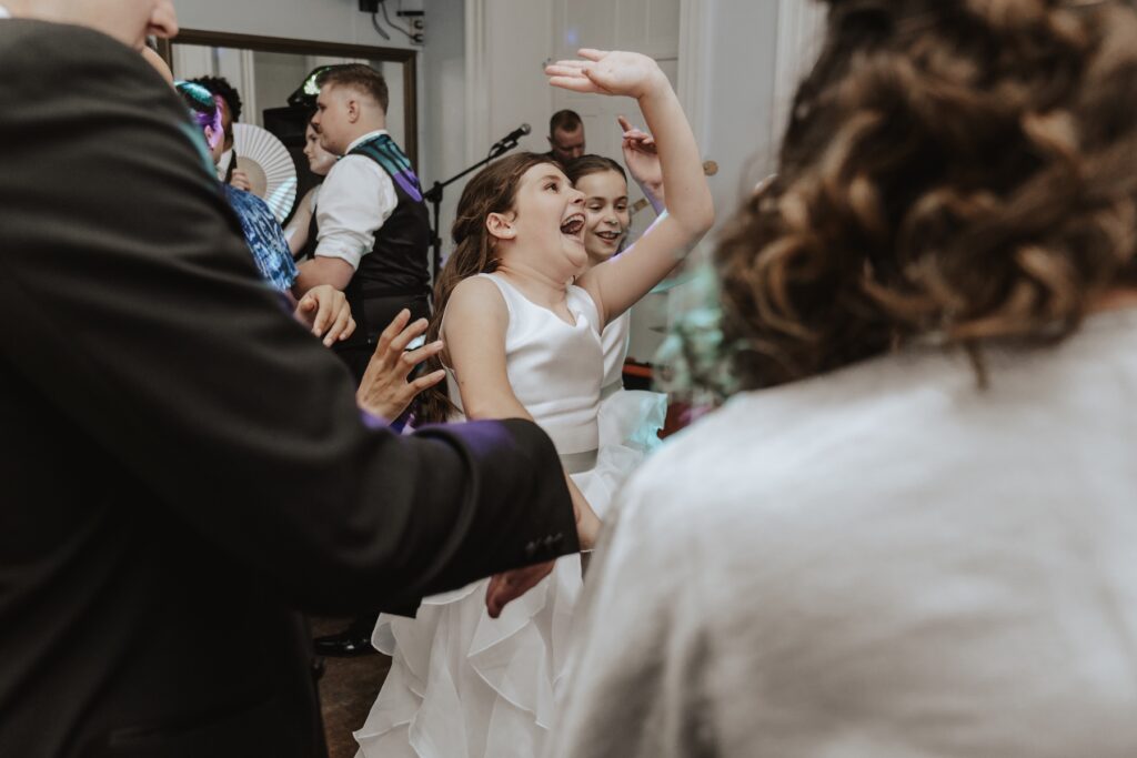 Guests dancing at the dance floor at Gosfield Hall