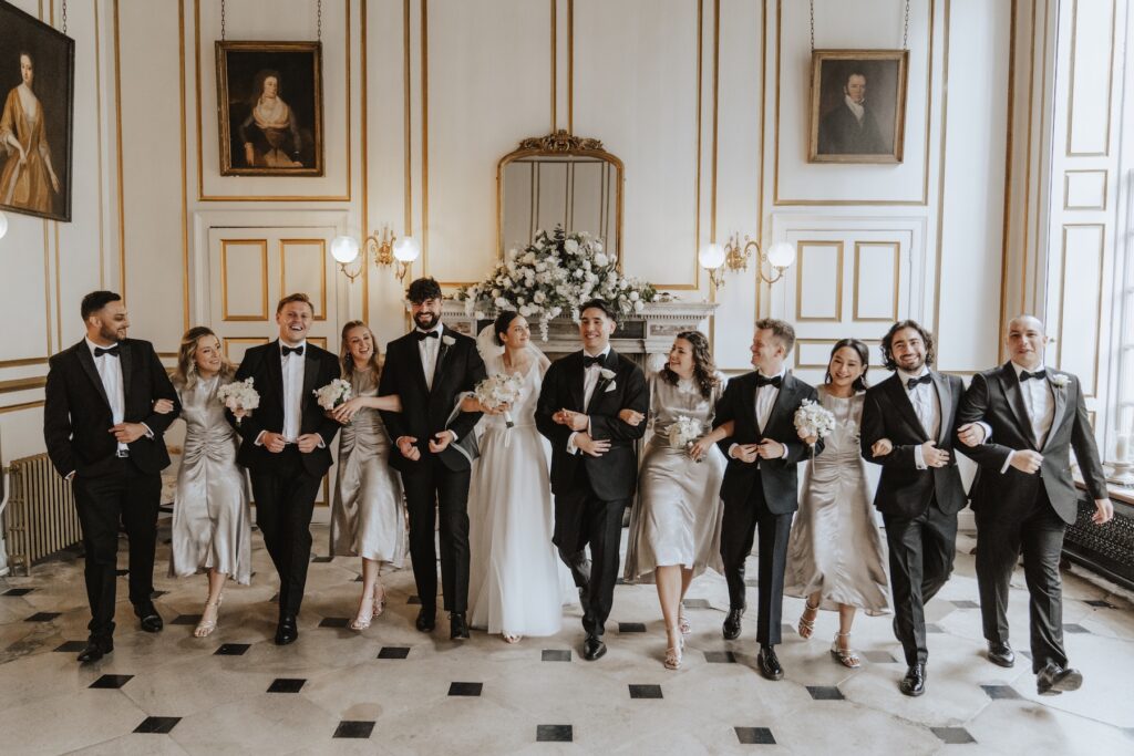 Bridesmaids and groomsmen indoor at Gosfield Hall